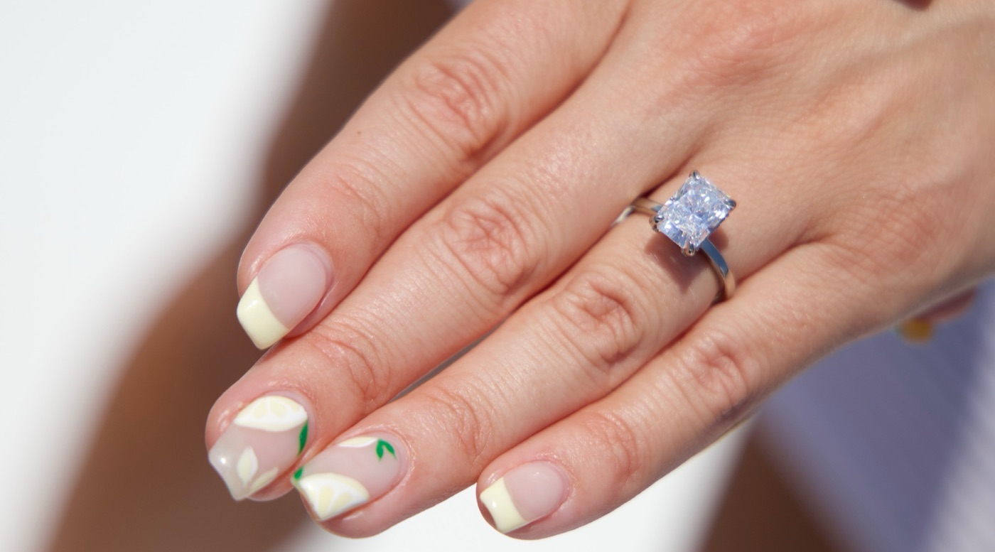 Radiant-cut diamond solitaire engagement ring